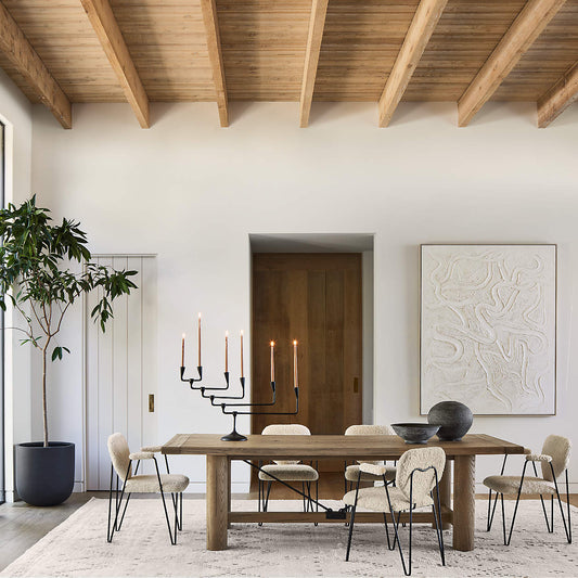 Oak extendable dining table — solid oak with weathered grey-brown finish, styled room horizontal view