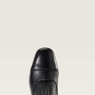 Equestrian paddock boot — full-grain leather detail, close-up toe