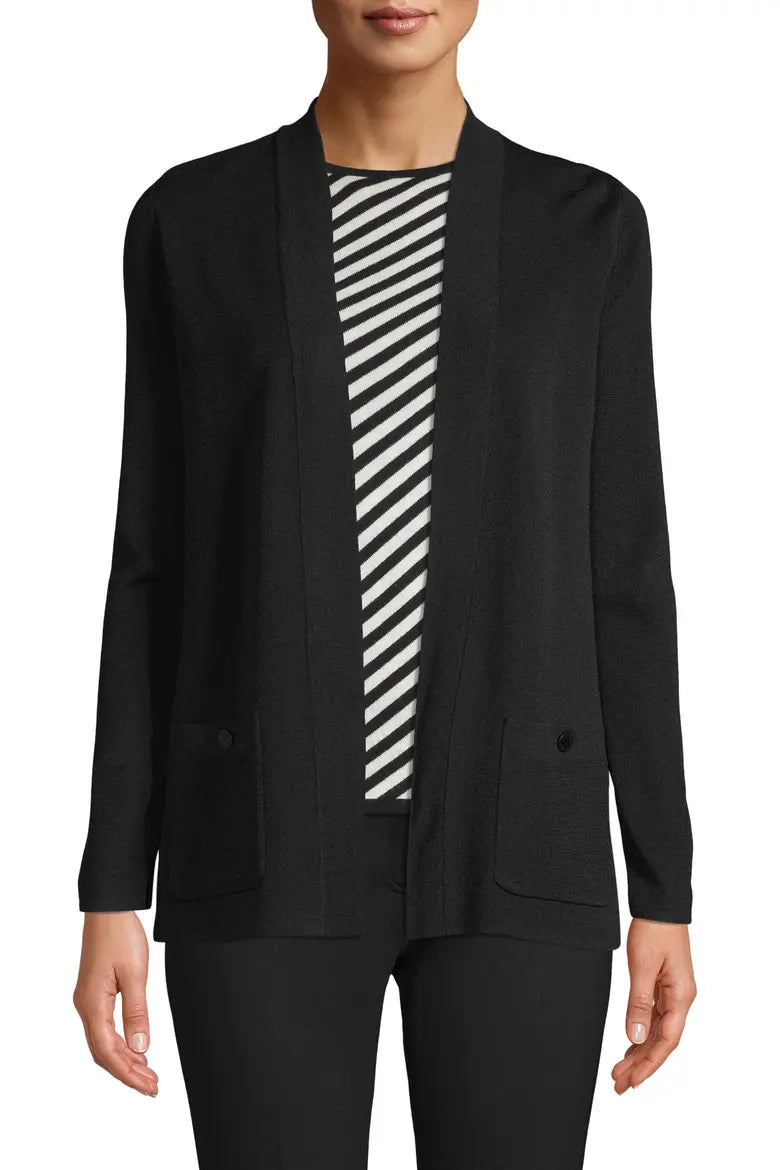 A woman wearing a black open-front cardigan over a black and white diagonally striped top, shown from the neck down against a plain white background.