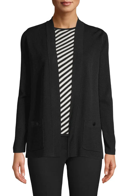 A woman wearing a black open-front cardigan over a black and white diagonally striped top, shown from the neck down against a plain white background.