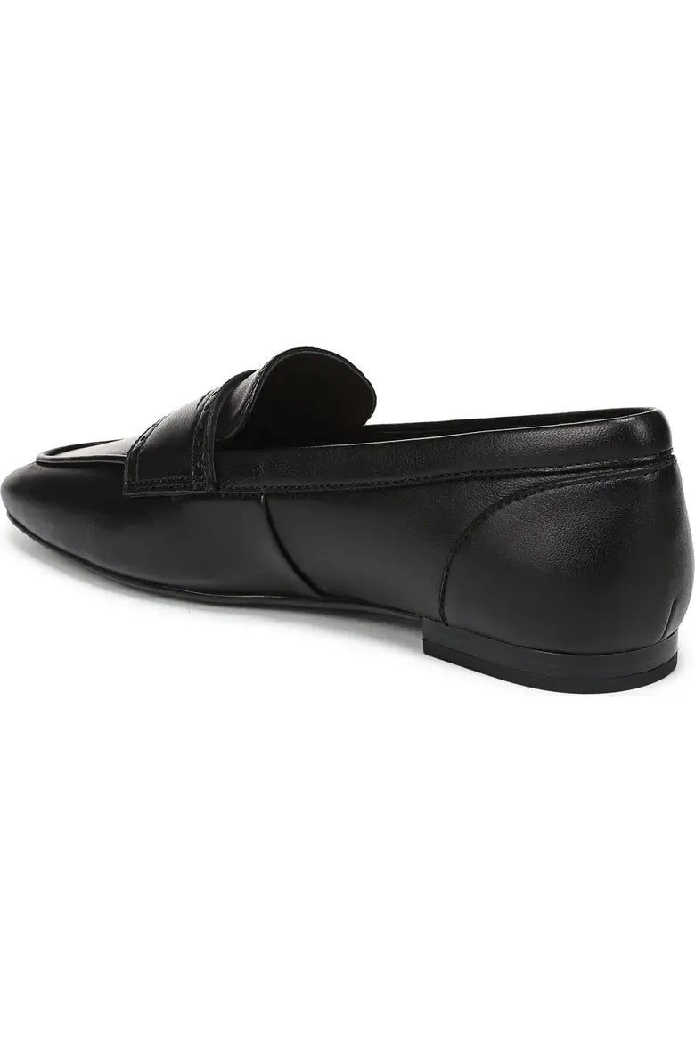 Black leather penny loafer three-quarter view shown form back angle