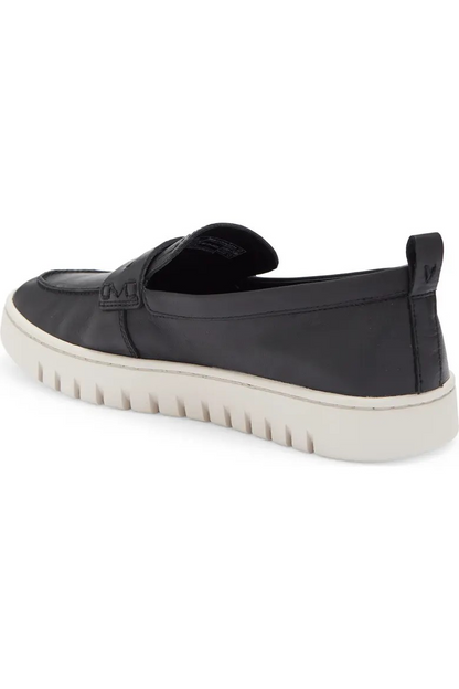 Black leather penny loafer three quarter view with heel pull tab 