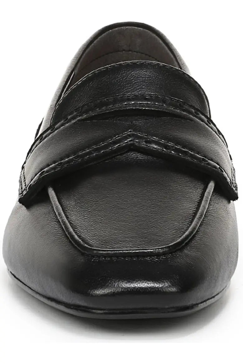 Black leather slip on penny loafer front toe closeup view 