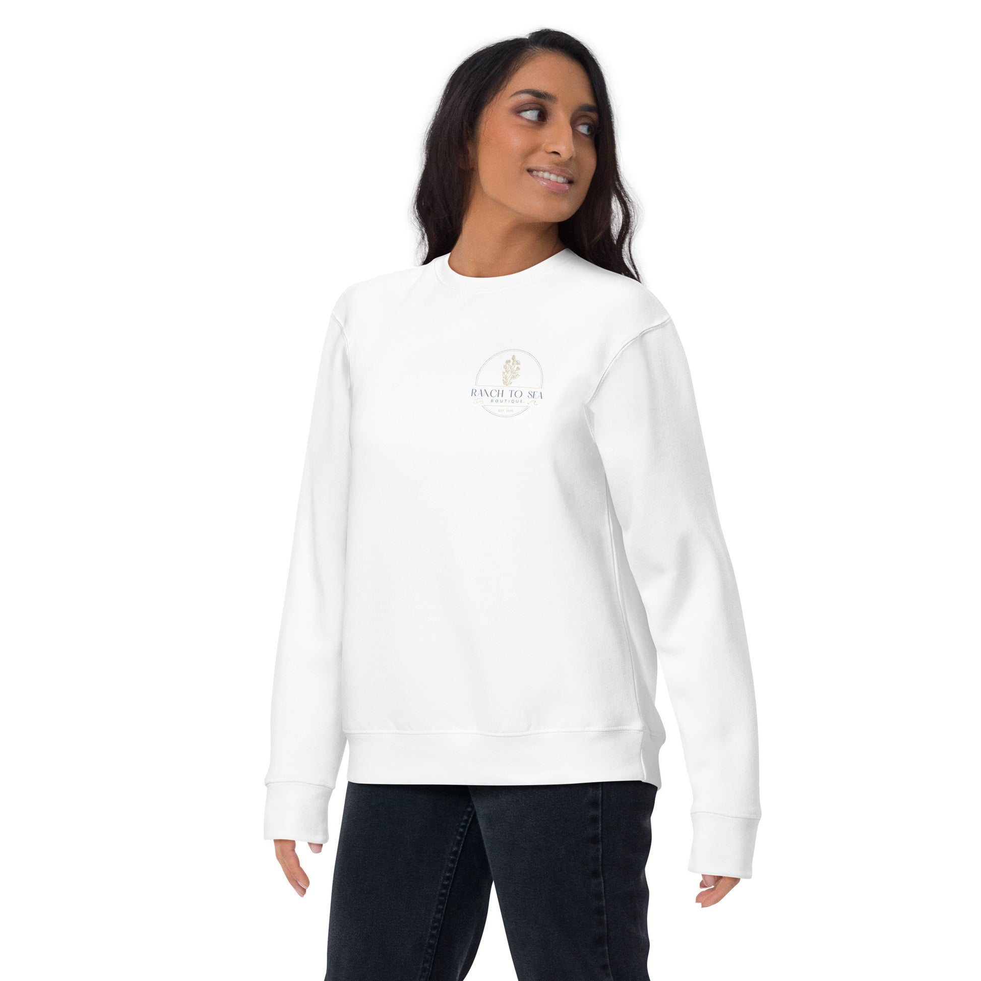 Crew neck fleece sweatshirt-woman wearing a white RTS sweatshirt with a logo on a white background