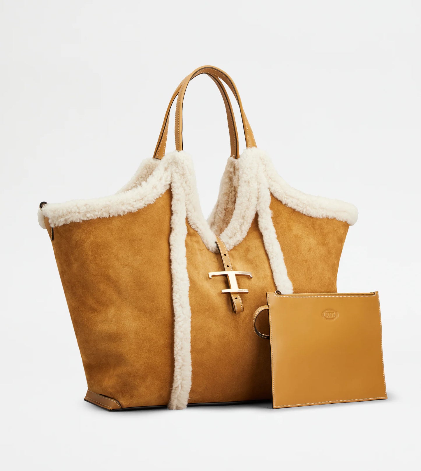 Medium suede shopping bag with soft sheepskin piping and metal T pendant in brown and white font view-