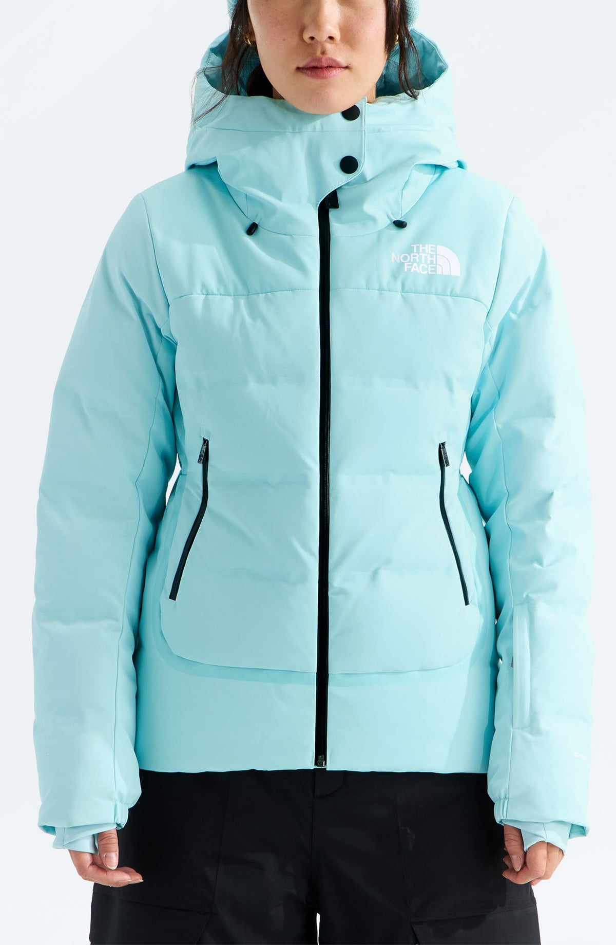 Light blue hooded down jacket with black front zip and zip pockets, front view on model