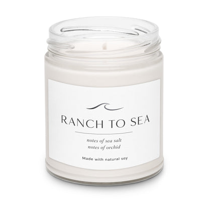 Product closeup after the fog natural soy candle in glass jar 