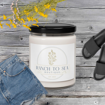 sea salt orchid candle — Ranch To Sea Boutique soy candle with branded label, shown in AI lifestyle concept on wooden surface with denim jeans and sandals (props not included) — results may vary, design image created using AI by RTS, see website for product details