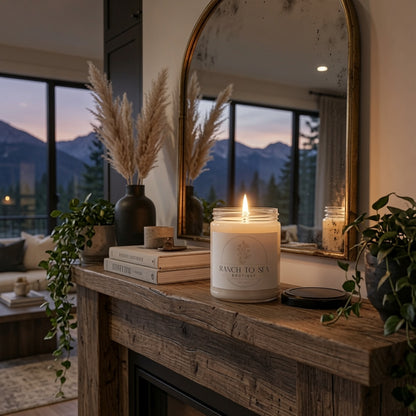 sea salt orchid candle — lit soy candle in clear glass jar on rustic wooden mantel in cozy living room setting, shown in AI lifestyle concept (may not be to scale, see website for dimensions; props not included) — results may vary, design image created using AI by RTS, see website for product details